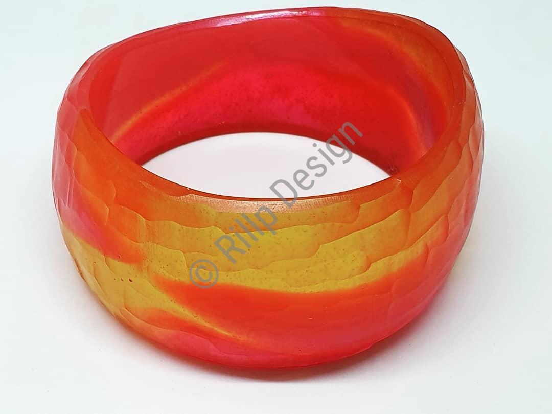 Have a look at this Extra Wide Pink and Orange Bangle